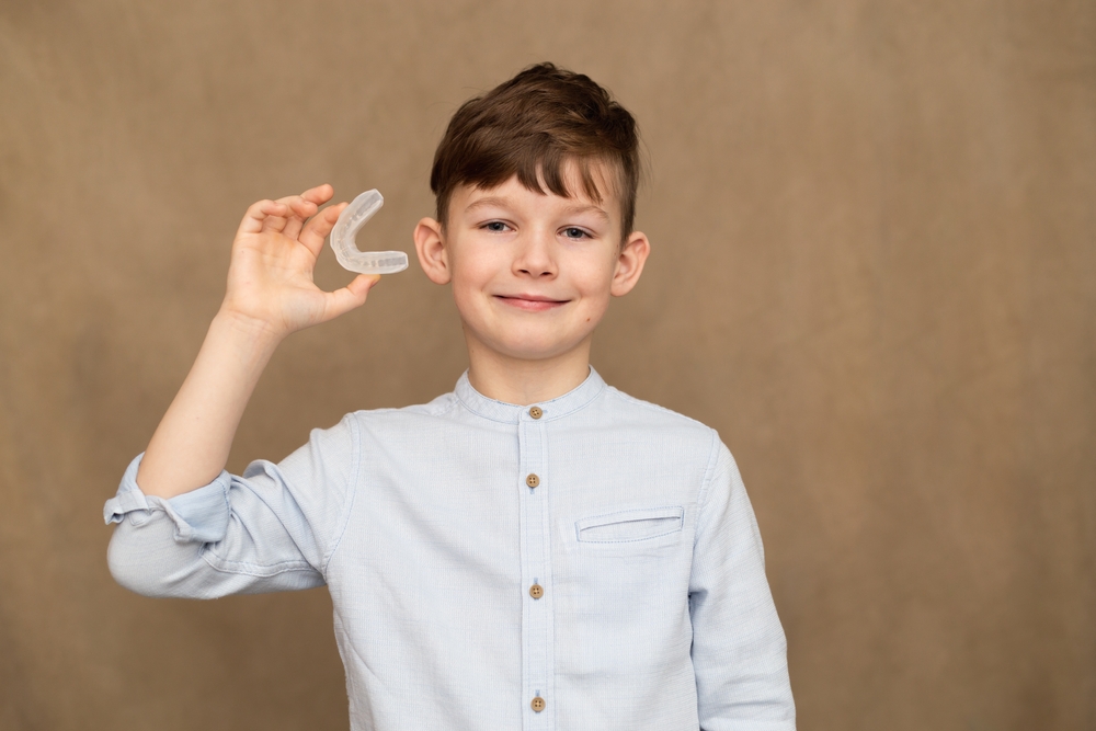 child with mouthguard